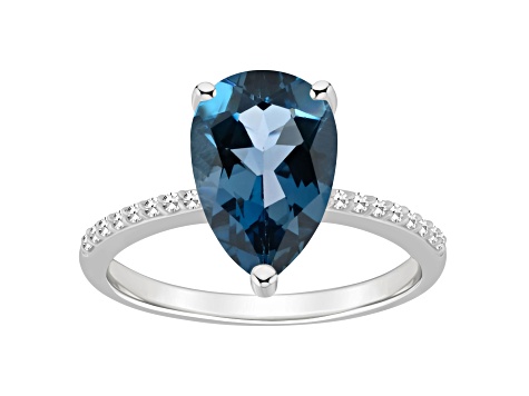 12x8mm Pear Shape London Blue Topaz and 1/10 ctw Diamond Rhodium Over Sterling Silver Ring