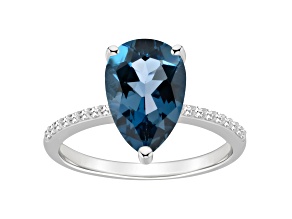 12x8mm Pear Shape London Blue Topaz and 1/10 ctw Diamond Rhodium Over Sterling Silver Ring