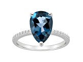 12x8mm Pear Shape London Blue Topaz and 1/10 ctw Diamond Rhodium Over Sterling Silver Ring