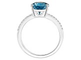 12x8mm Pear Shape London Blue Topaz and 1/10 ctw Diamond Rhodium Over Sterling Silver Ring