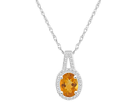 8x6mm Oval Citrine 1/7 ctw Diamond Rhodium Over Sterling Silver Halo Pendant with Chain