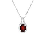 8x6mm Oval Garnet 1/7 ctw Diamond Rhodium Over Sterling Silver Halo Pendant with Chain