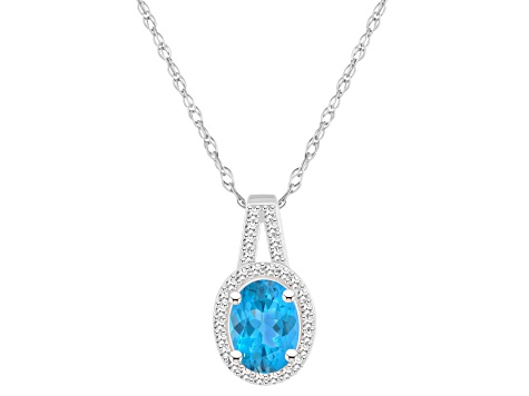 8x6mm Oval Blue Topaz 1/7 ctw Diamond Rhodium Over Sterling Silver Halo Pendant with Chain