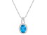 8x6mm Oval Blue Topaz 1/7 ctw Diamond Rhodium Over Sterling Silver Halo Pendant with Chain