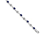 Rhodium Over 10k White Gold Oval Shaped Blue and Round Shaped White Sapphire Bracelet