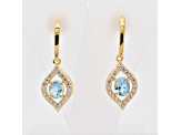 .80ctw Oval Sky Blue Topaz and Cubic Zirconia 14K Yellow Gold Over Sterling Silver Earrings