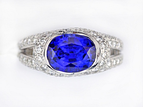 Oval Blue Sapphire and White Diamond Platinum Ring. 4.31 CTW