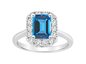 8x6mm Emerald Cut Swiss Blue Topaz And White Topaz Accents Rhodium Over Sterling Silver Halo Ring