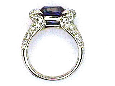 Oval Blue Sapphire and White Diamond Platinum Ring. 4.43 CTW