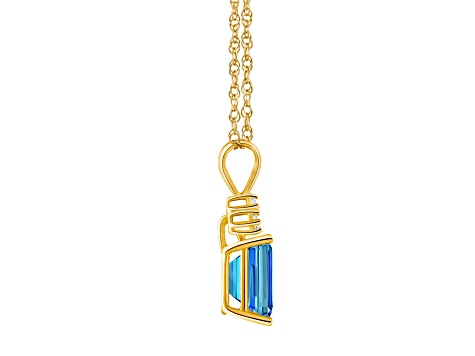 9x7mm Emerald Cut Blue Topaz 1/10 ctw Diamond 14k Yellow Gold Pendant With Chain