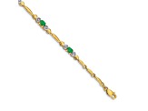 10k Yellow Gold and Rhodium Over 10k Yellow Gold Diamond and Emerald Bracelet