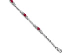 Rhodium Over 10k White Gold Diamond and Ruby Bracelet