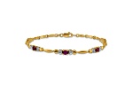 10k Yellow Gold and Rhodium Over 10k Yellow Gold Diamond and Ruby Bracelet