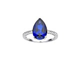 Pear Shape Lab Created Blue Sapphire and White Topaz Rhodium Over Sterling Silver Ring