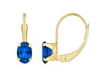6x4mm Oval Lab Created Sapphire 10k Yellow Gold Drop Earrings