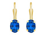 6x4mm Oval Created Sapphire 10k Yellow Gold Drop Earrings