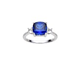 Lab Created Blue Sapphire and White Topaz Rhodium Over Sterling Silver Ring