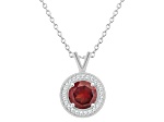 7mm Round Garnet 1/8 ctw Diamond Rhodium Over Sterling Silver Halo Pendant with Chain