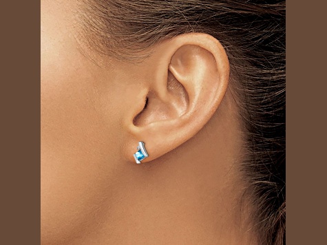 Rhodium Over 10k White Gold 0.64ctw Cushion Blue Topaz Birthstone and Diamond Stud Earrings