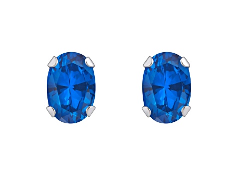 6x4mm Oval Created Sapphire Rhodium Over 10k White Gold Stud Earrings