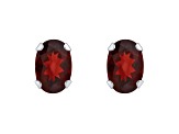 6x4mm Oval Garnet Rhodium Over 10k White Gold Stud Earrings