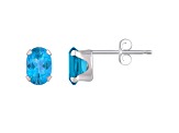 6x4mm Oval Blue Topaz Rhodium Over 10k White Gold Stud Earrings