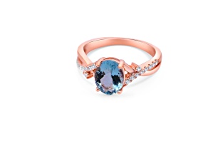 9x7mm Oval Aquamarine and White CZ 18K Rose Gold Over Sterling Silver Ring, 1.54ctw