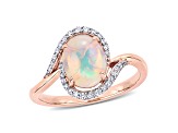 1ct Blue Ethiopian Opal And 0.14ctw Diamond 10k Rose Gold Halo Ring