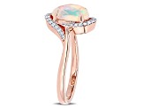 1ct Blue Ethiopian Opal And 0.14ctw Diamond 10k Rose Gold Halo Ring
