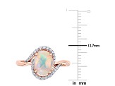 1ct Blue Ethiopian Opal And 0.14ctw Diamond 10k Rose Gold Halo Ring