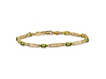 10k Yellow Gold and Rhodium Over 10k Yellow Gold Diamond and Peridot Bracelet
