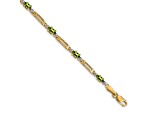 10k Yellow Gold and Rhodium Over 10k Yellow Gold Diamond and Peridot Bracelet