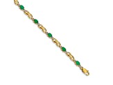 14k Yellow Gold and Rhodium Over 14k Yellow Gold Diamond and Oval Emerald Bracelet