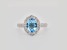 Oval Swiss Blue Topaz and Cubic Zirconia Rhodium Over Sterling Silver Ring