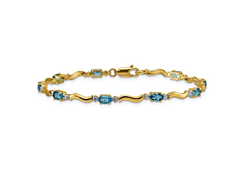 14k Yellow Gold and Rhodium Over 14k Yellow Gold Fancy Diamond and Blue Topaz Bracelet