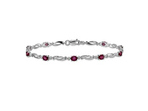 Rhodium Over 10k White Gold Diamond and Red Ruby Bracelet