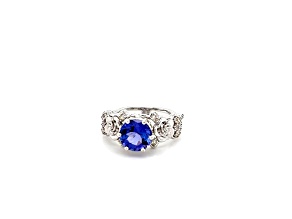 Round Tanzanite and White Diamond 10K White Gold Flower Ring