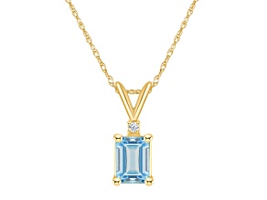 7x5mm Emerald Cut Aquamarine with Diamond Accent 14k Yellow Gold Pendant With Chain