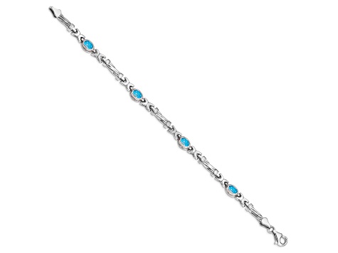 Rhodium Over 10k White Gold Blue Topaz 4 Stone Bracelet