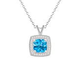 7mm Cushion Blue Topaz 1/7 ctw Diamond Rhodium Over Sterling Silver Halo Pendant with Chain