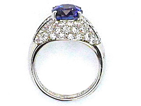 Oval Blue Sapphire and White Diamond Platinum Ring. 5.85 CTW