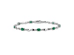 Rhodium Over 10k White Gold Diamond and Green Emerald Bracelet