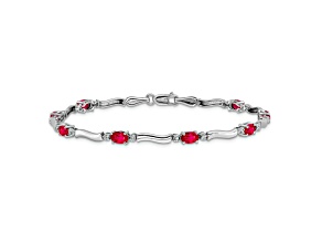 Rhodium Over 10k White Gold Diamond and Red Ruby Bracelet