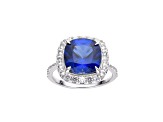 Lab Created Blue Sapphire and White Topaz Rhodium Over Sterling Silver Halo Ring