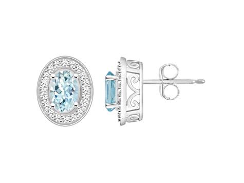 6x4mm Oval Aquamarine 1/5 ctw Diamond Rhodium Over Sterling Silver Halo Stud Earrings