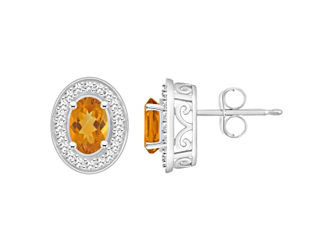 6x4mm Oval Citrine 1/5 ctw Diamond Rhodium Over Sterling Silver Halo Stud Earrings