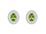 6x4mm Oval Peridot 1/5 ctw Diamond Rhodium Over Sterling Silver Halo Stud Earrings