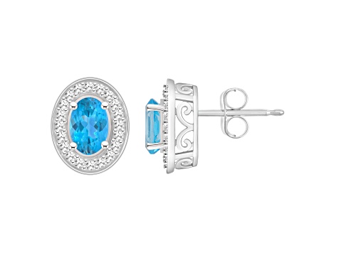 6x4mm Oval Blue Topaz 1/5 ctw Diamond Rhodium Over Sterling Silver Halo Stud Earrings