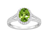 8x6mm Oval Peridot 1/4 ctw Diamond Rhodium Over Sterling Silver Halo Ring