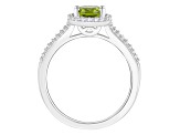 8x6mm Oval Peridot 1/4 ctw Diamond Rhodium Over Sterling Silver Halo Ring